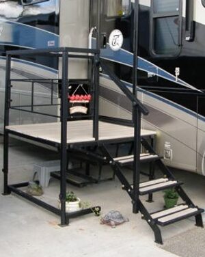 A step up platform with steps leading to the top of it.